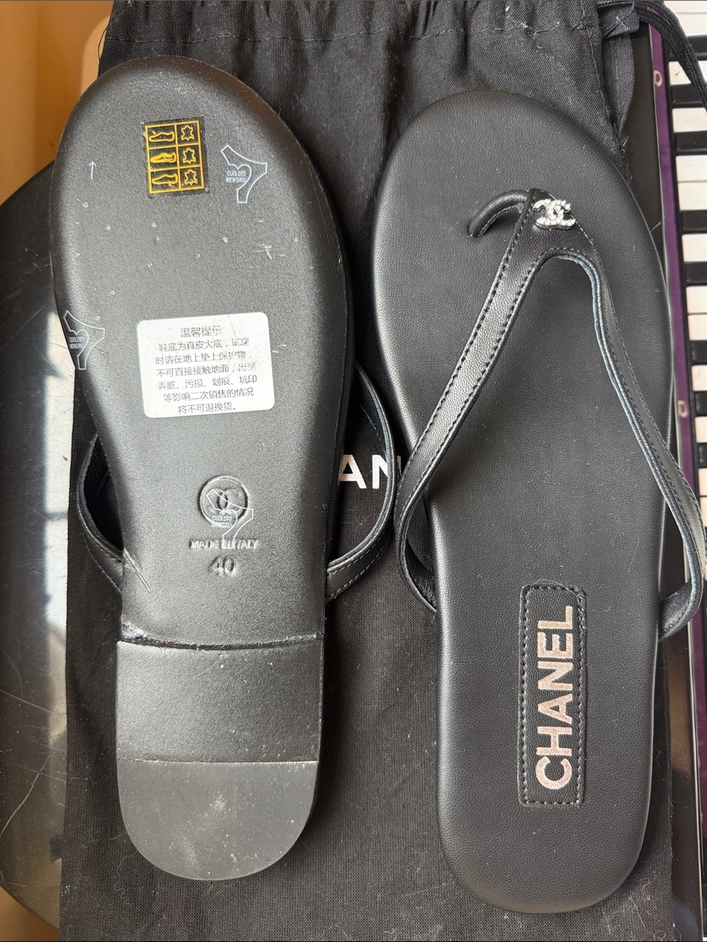 CHANEL Black Leather Logo Thong Sandals with Silver CC Charm